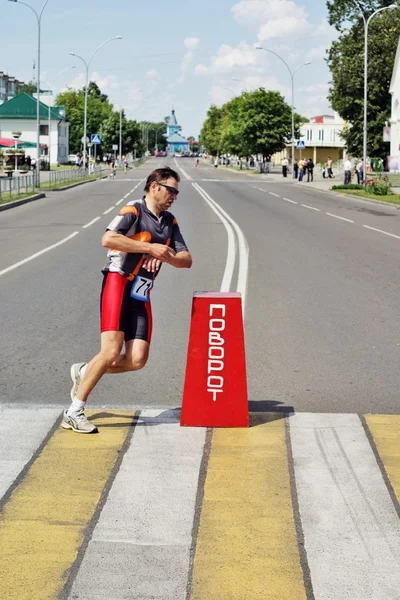 Athlet çalışan triatlon — Stok fotoğraf
