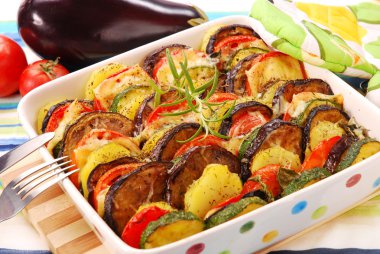 Vegetables baked with cheese clipart