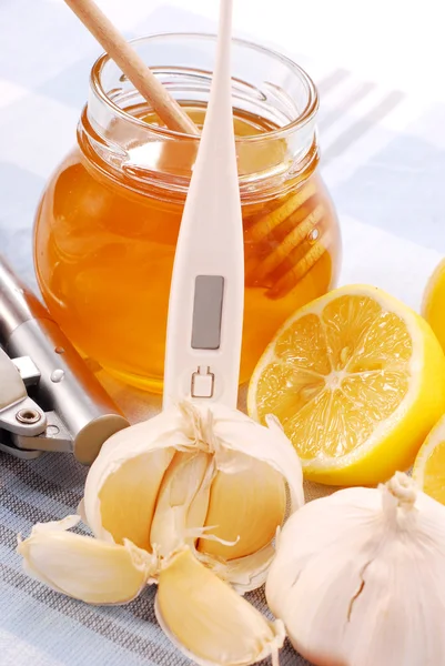 Méz, fokhagyma és citrom — Stock Fotó
