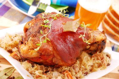 Pork knuckle baked with beer clipart