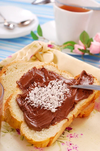 Sweet bun with chocolate cream — Stock Photo, Image