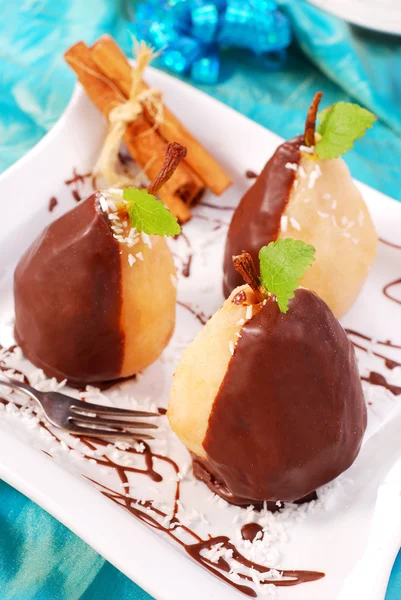 Pears poured with chocolate — Stock Photo, Image