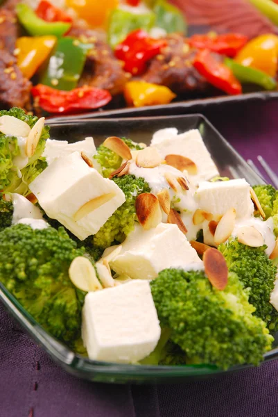 Broccoli salad with feta and almonds — Stock Photo, Image
