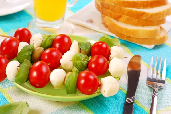 Mozzarella,tomatoes and olives shashlik — Stock Photo, Image