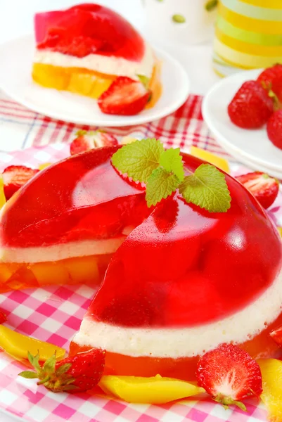 Strawberry and mango jelly with cream — Stock Photo, Image