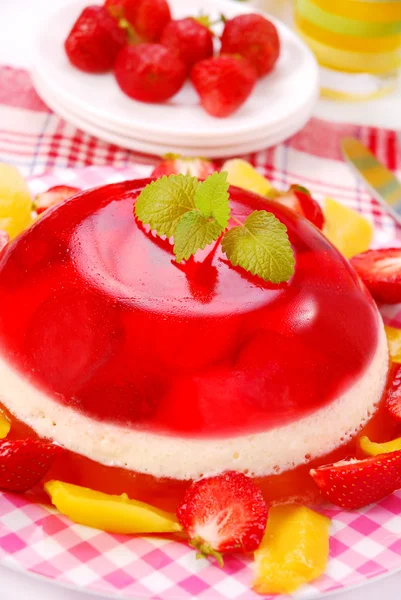 Strawberry and mango jelly with cream — Stock Photo, Image
