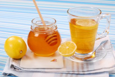 Tea with lemon and honey clipart