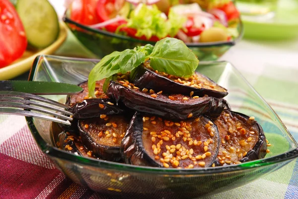 Grilled aubergine with sesame seeds — Stock Photo, Image