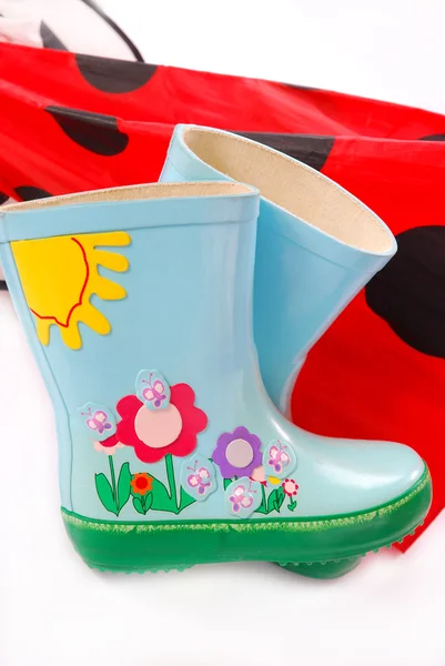 Children`s wellington boots and umbrella — Stock Photo, Image
