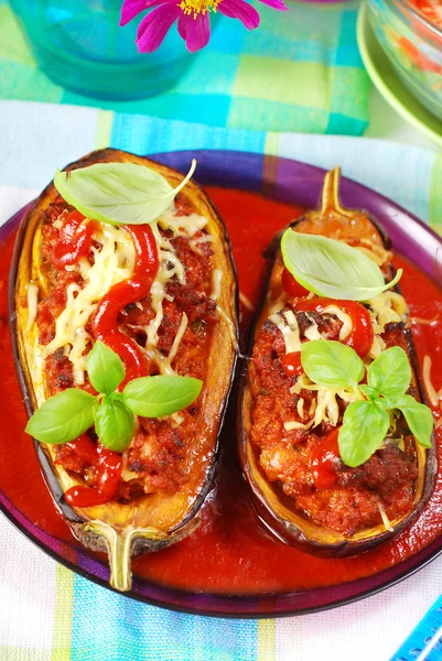 Aubergine stuffed with meat in tomato sauce — Stock Photo, Image