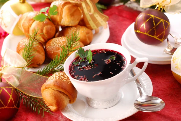 Red borscht and yeast pastries for christmas — Stock Photo, Image