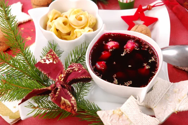 Red borscht with mushroom ravioli for christmas eve — Stock Photo, Image