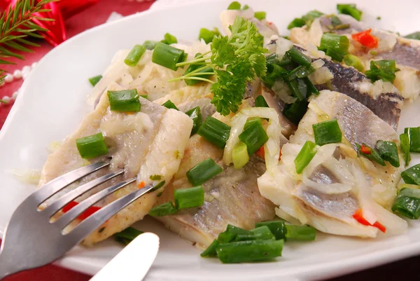 Herring in oils with chive and onion for christmas — Stock Photo, Image