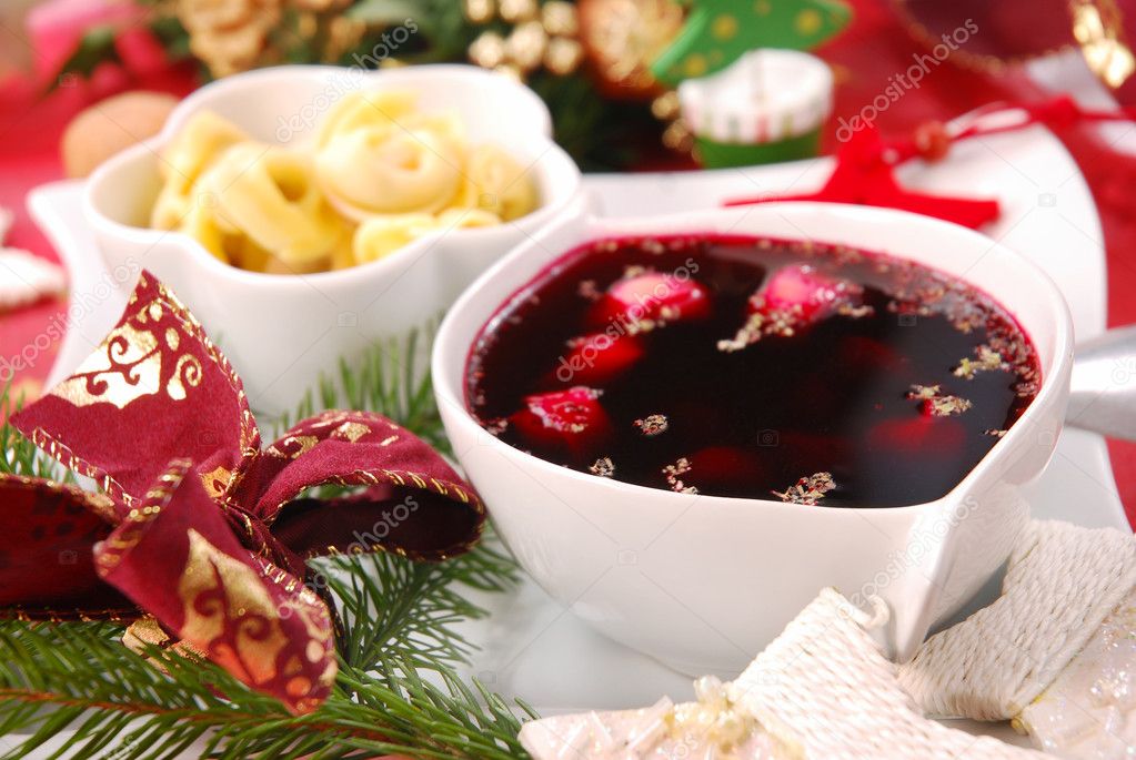 Red borscht with mushroom ravioli for christmas eve