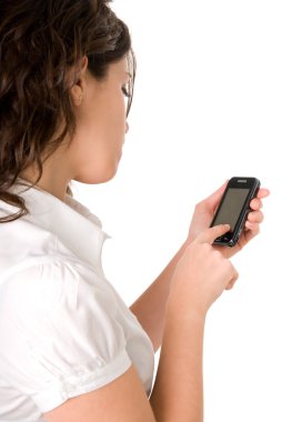Female using a modern cell phone clipart