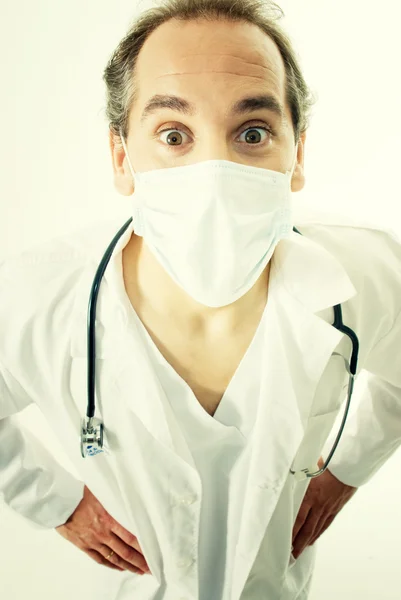 Médico com estetoscópio e máscara médica — Fotografia de Stock