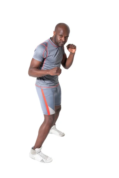 Negro hombre entrenamiento aislado longitud completa retrato — Foto de Stock