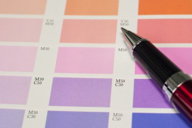 A pen and process color chart clipart