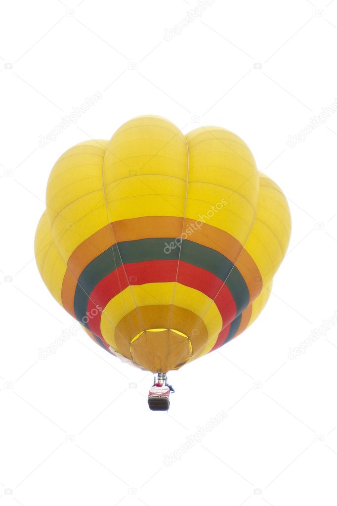 Colorful hot air balloons float in the