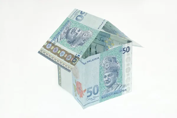 Malaysian Ringgit isn a Shape of a House — Stock Photo, Image