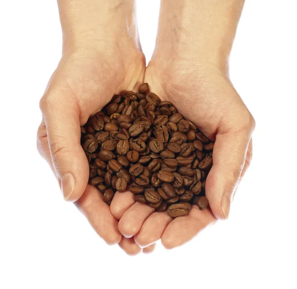 Grains de café dans les mains — Photo