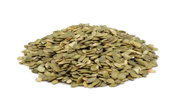 Kupie łuskane nasiona dyni, na białym tle — Zdjęcie stockowe