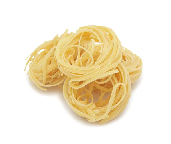 stock image Uncooked pasta nest, isolated