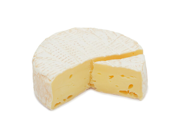 Round Brie cheese, with a section cut out, isolated