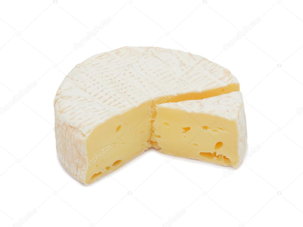 Round Brie cheese, with a section cut out, isolated