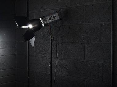 Photography studio light against a black clipart