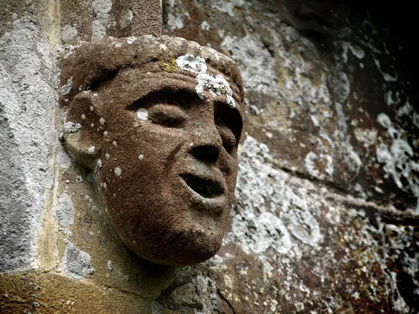 stock image Gothic smiley stone face