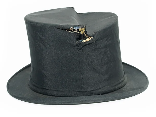 Vintage broken black top hat isolated ag — Stock Photo, Image