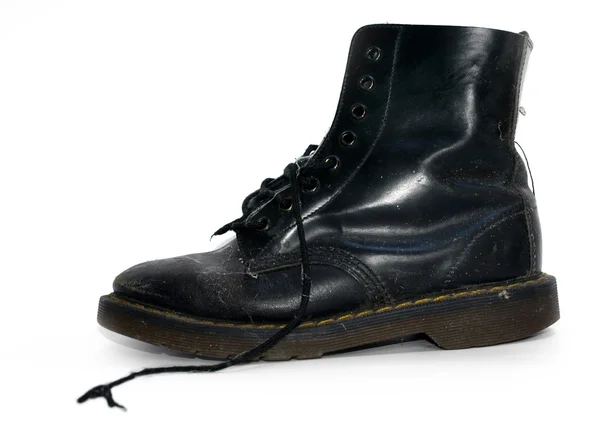 Un negro desgastado botas de trabajo —  Fotos de Stock