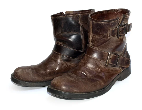 A pair of old brown leather worn out wor — Stock Photo, Image