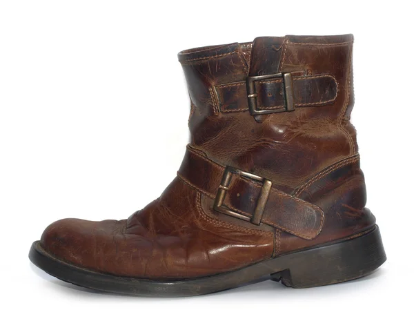 Um velho couro marrom desgastado botas de trabalho — Fotografia de Stock