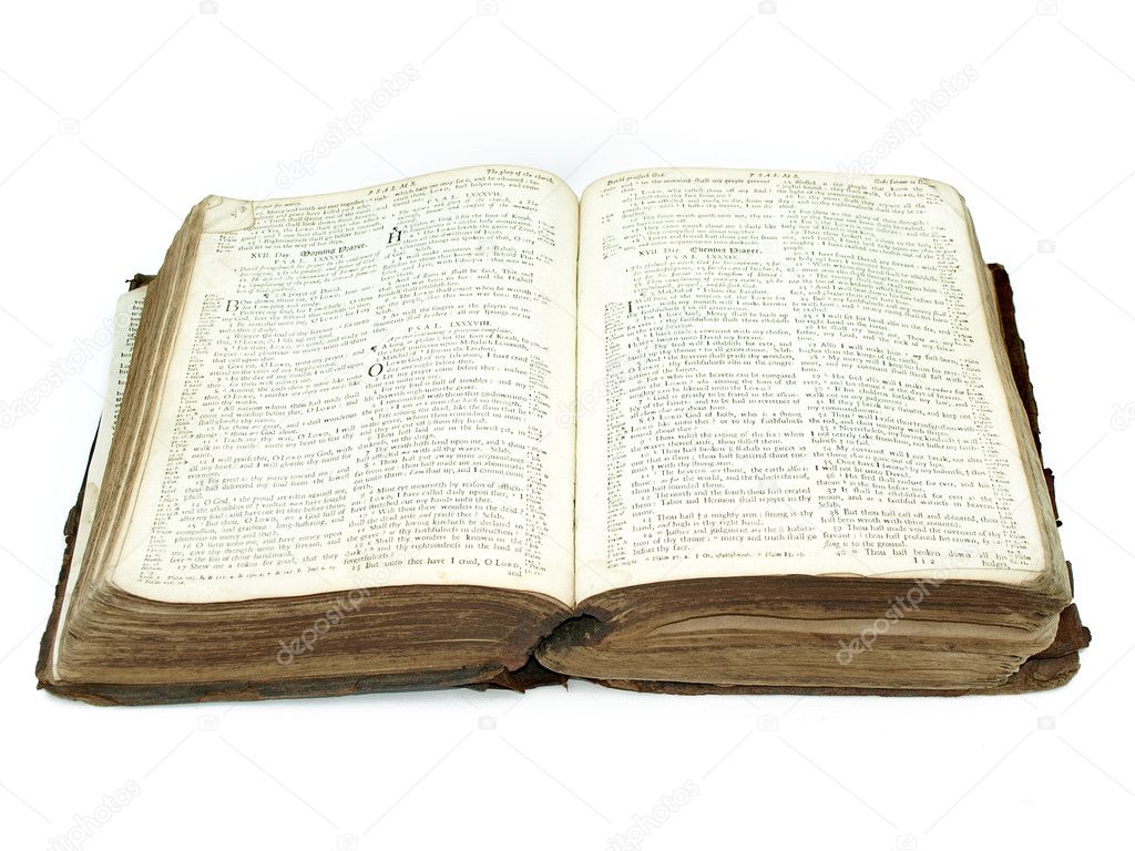 Large vintage open bible isolated agains