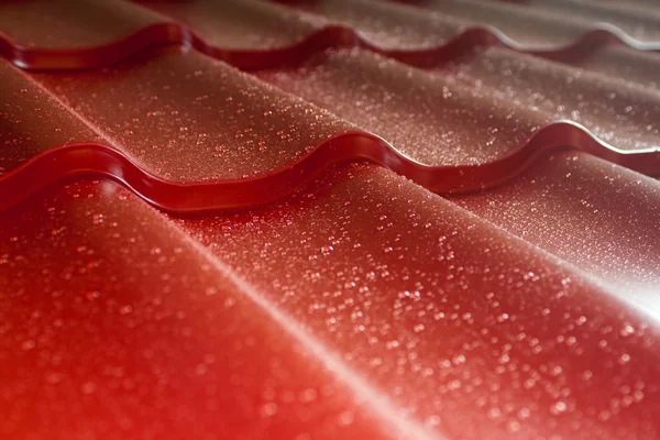 Closeup of red metal roof covering — Stock Photo, Image