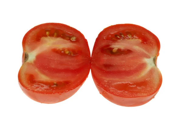 Tomates vermelhos sobre um fundo branco — Fotografia de Stock