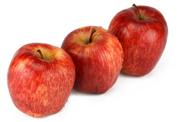 Tři červená jablka. — Stock fotografie