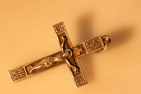 Cross on a brown background — Stock Photo, Image