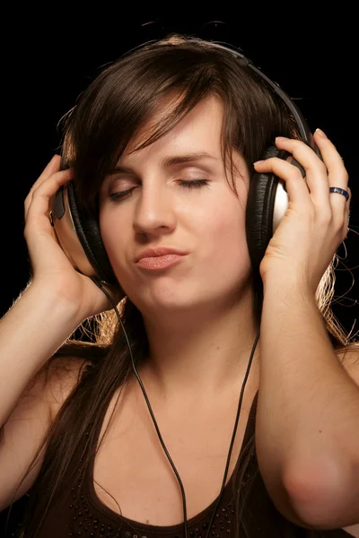 stock image Girl in headphones enjoying music