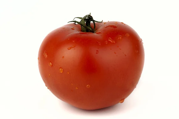 Tomate vermelho sobre um fundo branco — Fotografia de Stock