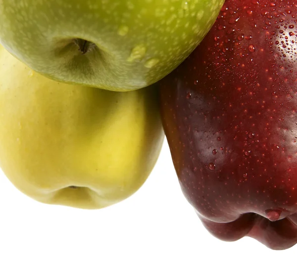 Tři vícebarevné jablka — Stock fotografie