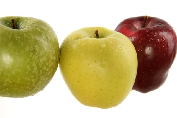 Три багатобарвна яблука — стокове фото