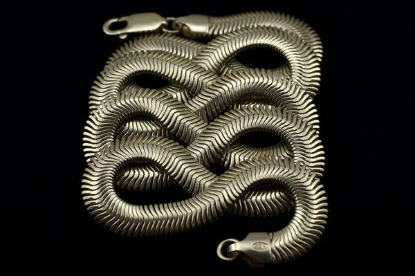 Silver chain on a black background — Stock Photo, Image