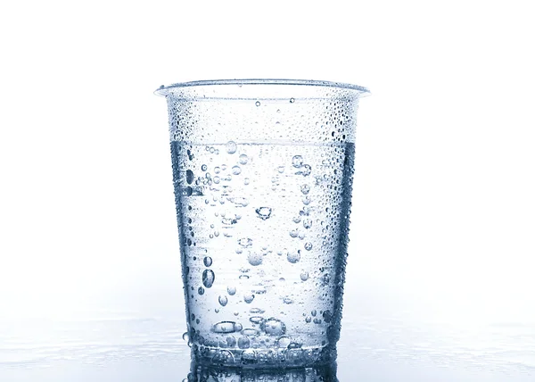 Plastic cup with water — Stock Photo, Image