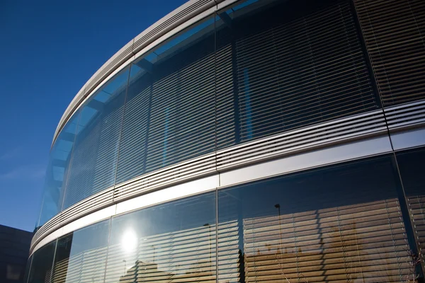 Curved glass office building — Stock Photo, Image