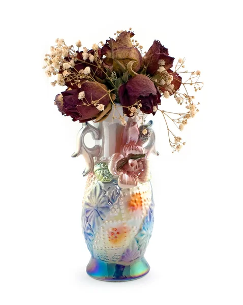 Bukett av torkade rosor i en vas — Stockfoto