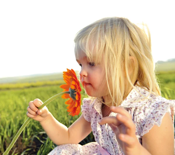 Smelling flowers — Stock Photo © Daxiao_Productions #3917207