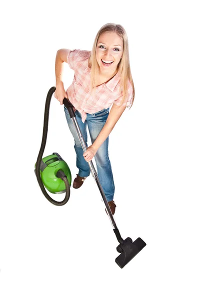 Kadın elektrikli süpürgeyle temizlik yapıyor. — Stok fotoğraf